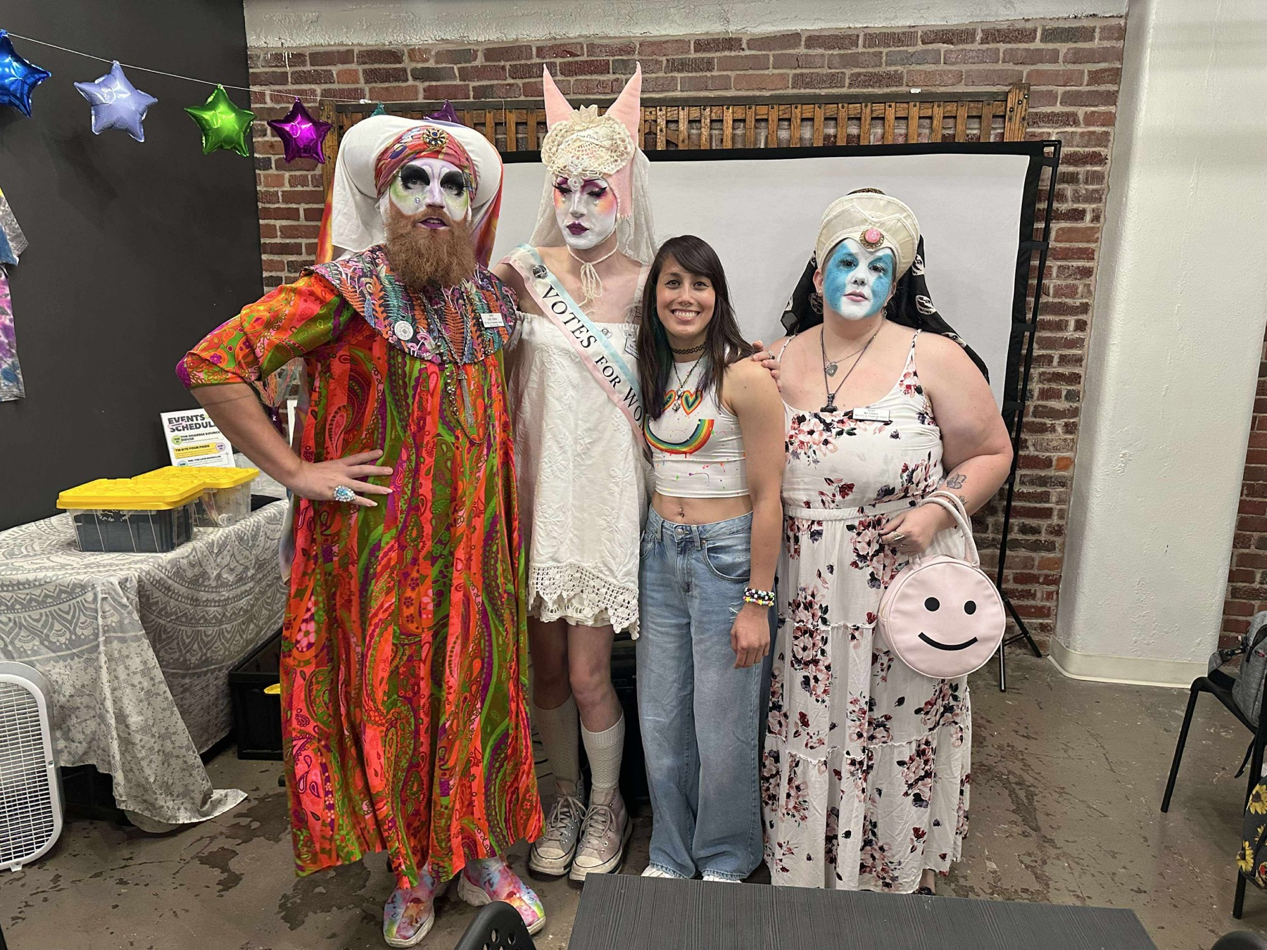 PSKC community members and performers posing together at the Tiedye Your Pride event in 2025